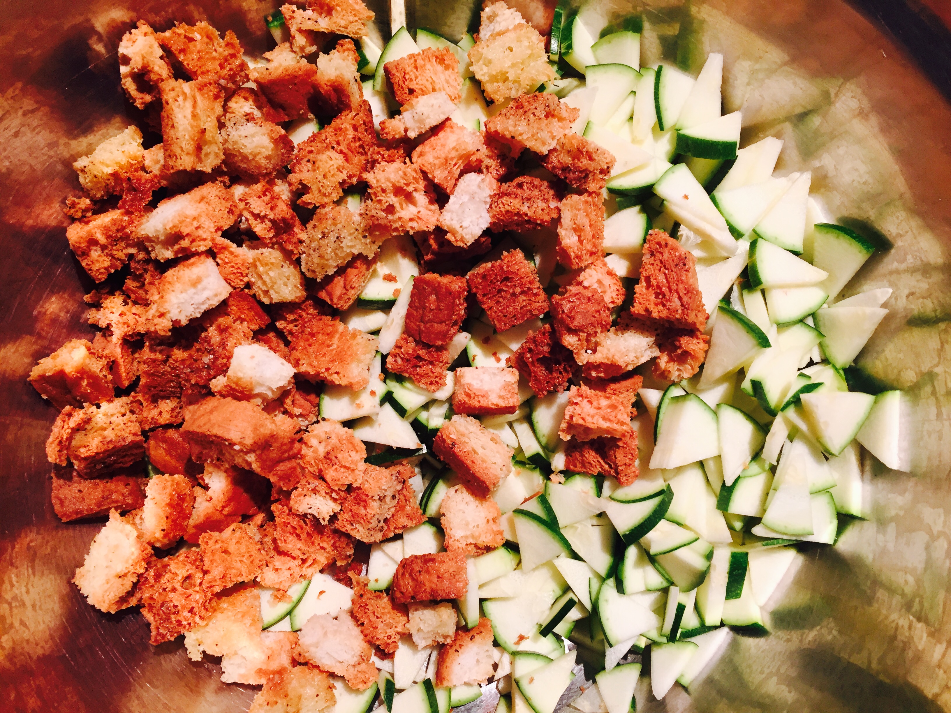 Chopped raw zucchini with home-made baked gluten free croutons