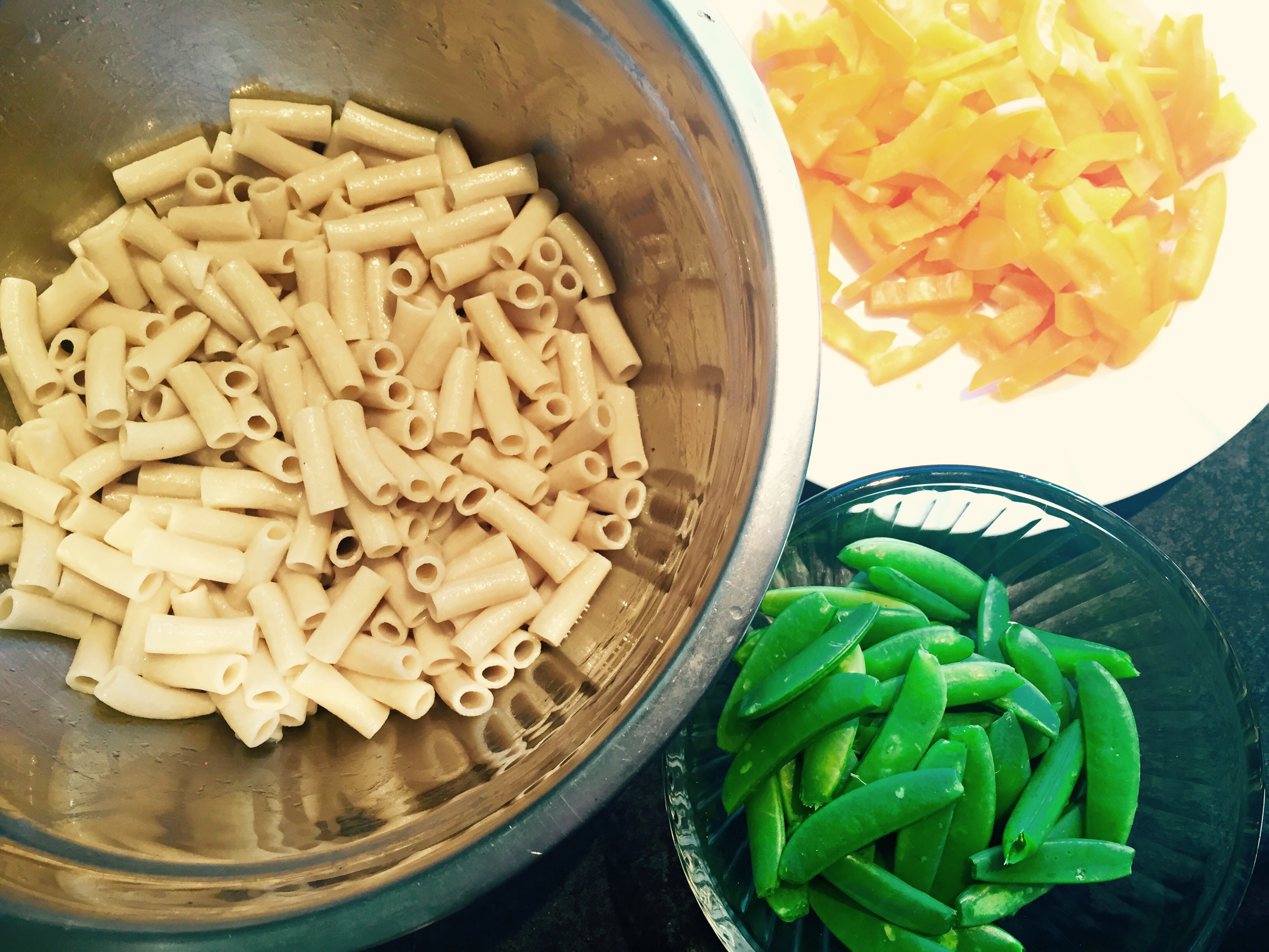 Rice flour Penne al dente with Snap Peas & Sweet Peppers waiting for some Pesto goodness