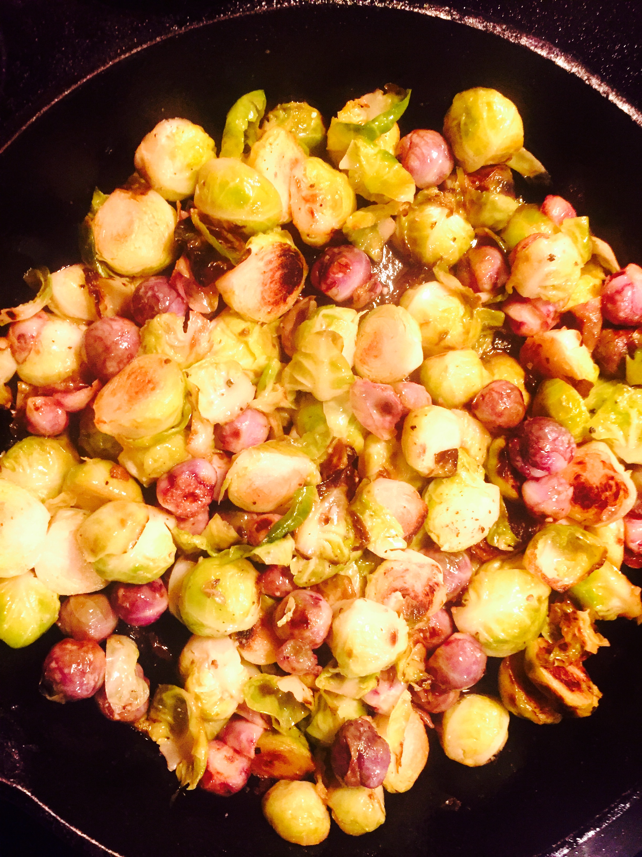 Green & purple brussel sprouts happily sautéing