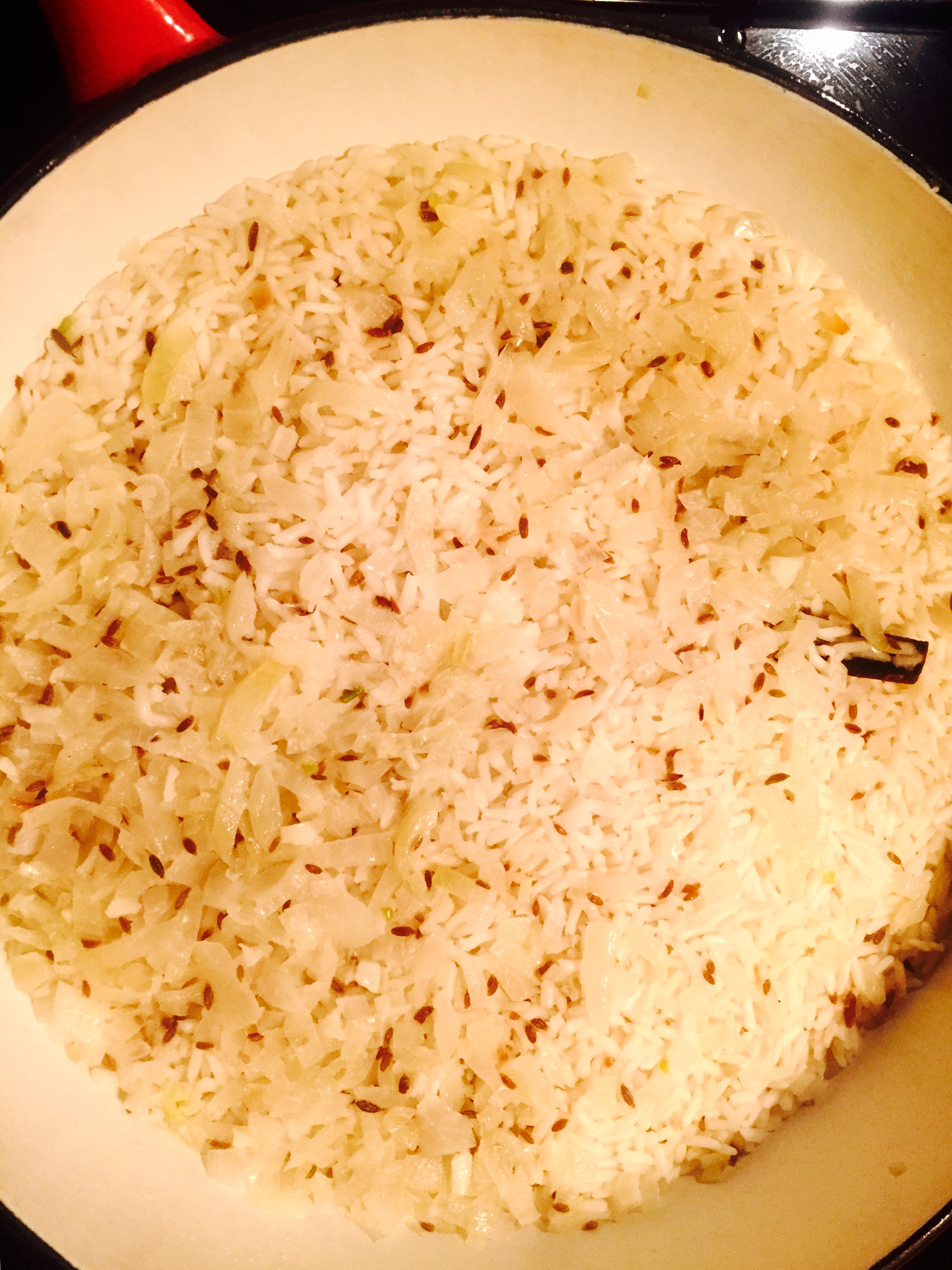 Toasted basmati & cumin seeds with onions & garlic