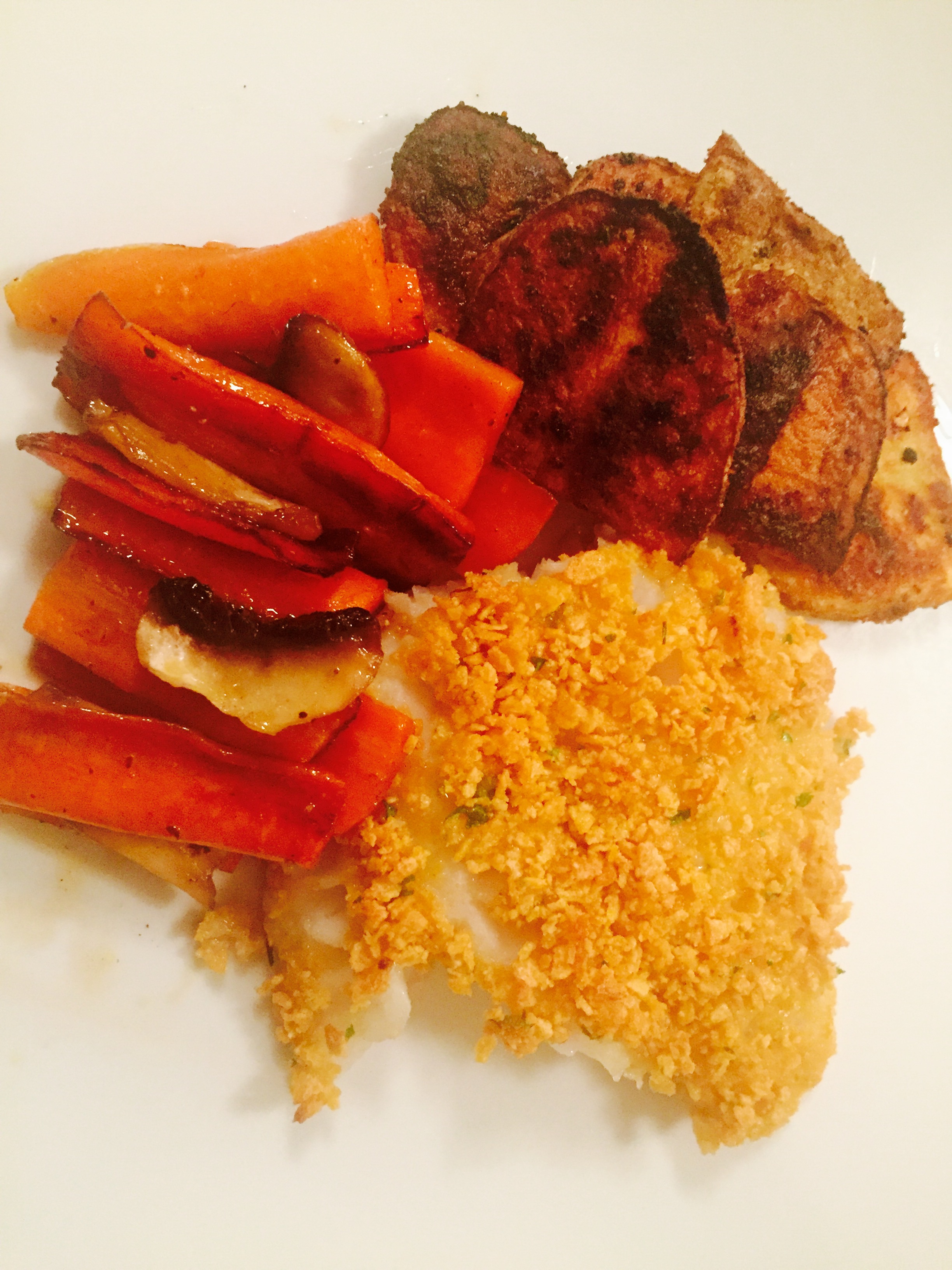 Crispy baked cod with maple glazed carrots and roasted potatoes