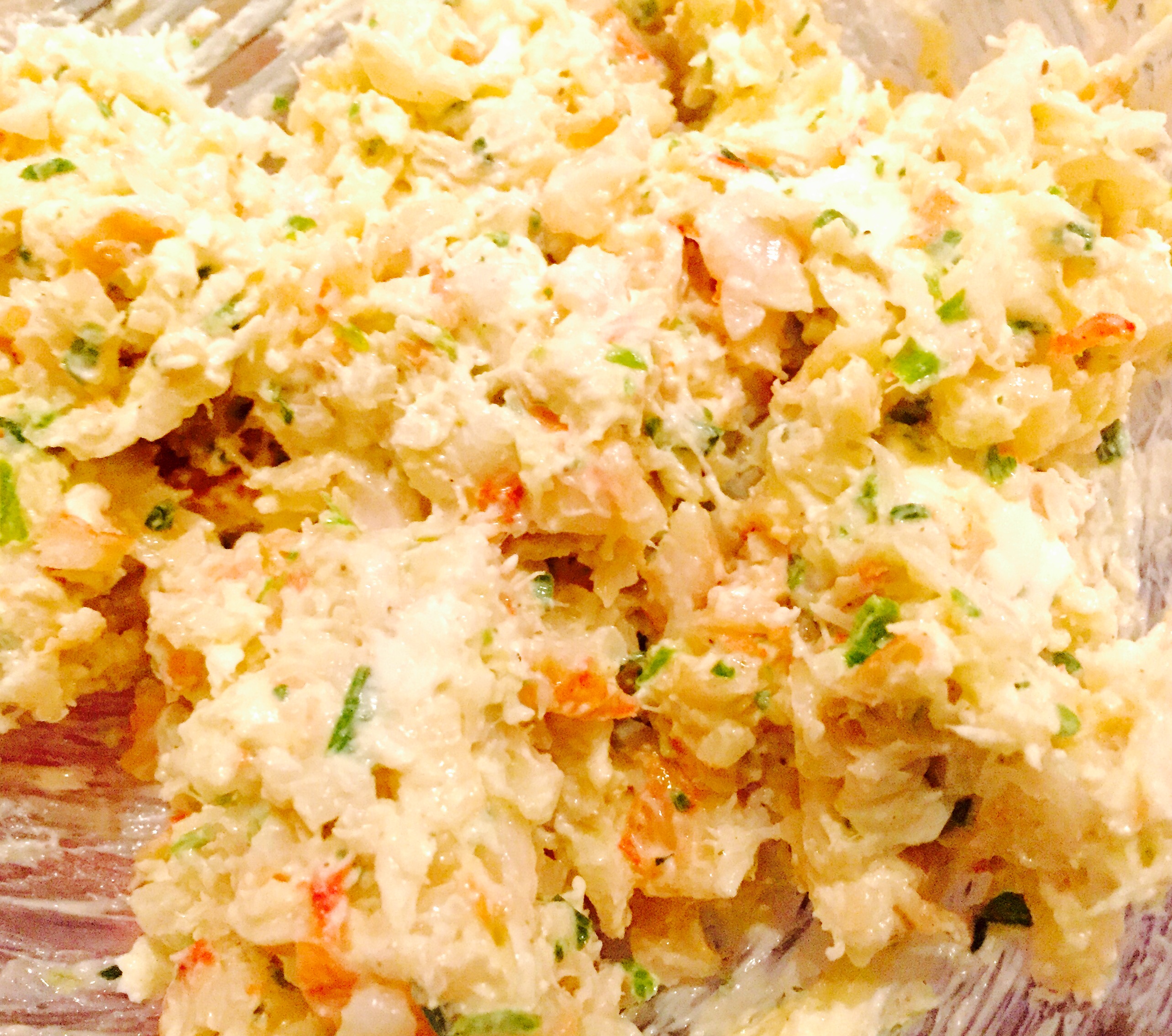 Shrimp poached in butter and white wine, minced and combined with goat cheese, lemon and chives