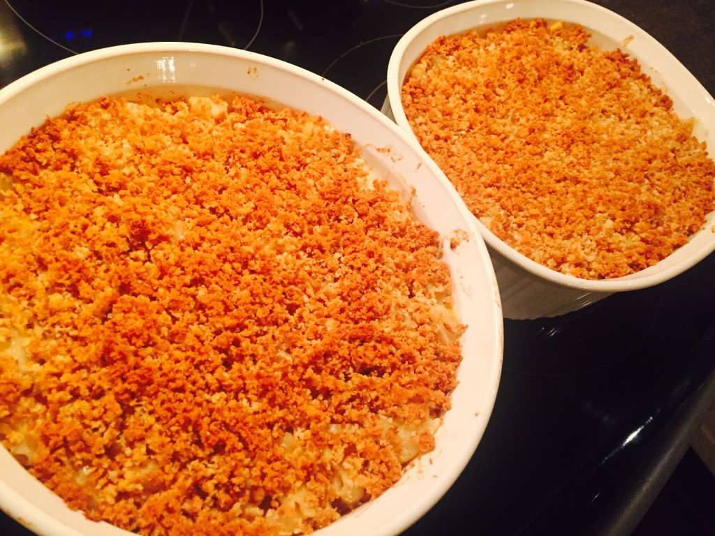 Two lovely mac n cheese casseroles piping hot out of the oven