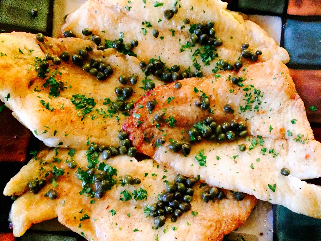 Irresistible results, delicious sole meuniere smothered in dairy free brown "butter" with capers and freshly minced parsley.