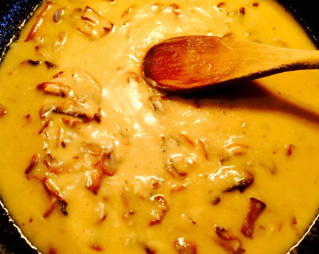 A ridiculously delicious creamy sauce with dairy-free smoked gouda and nutty brown sauteed mushrooms