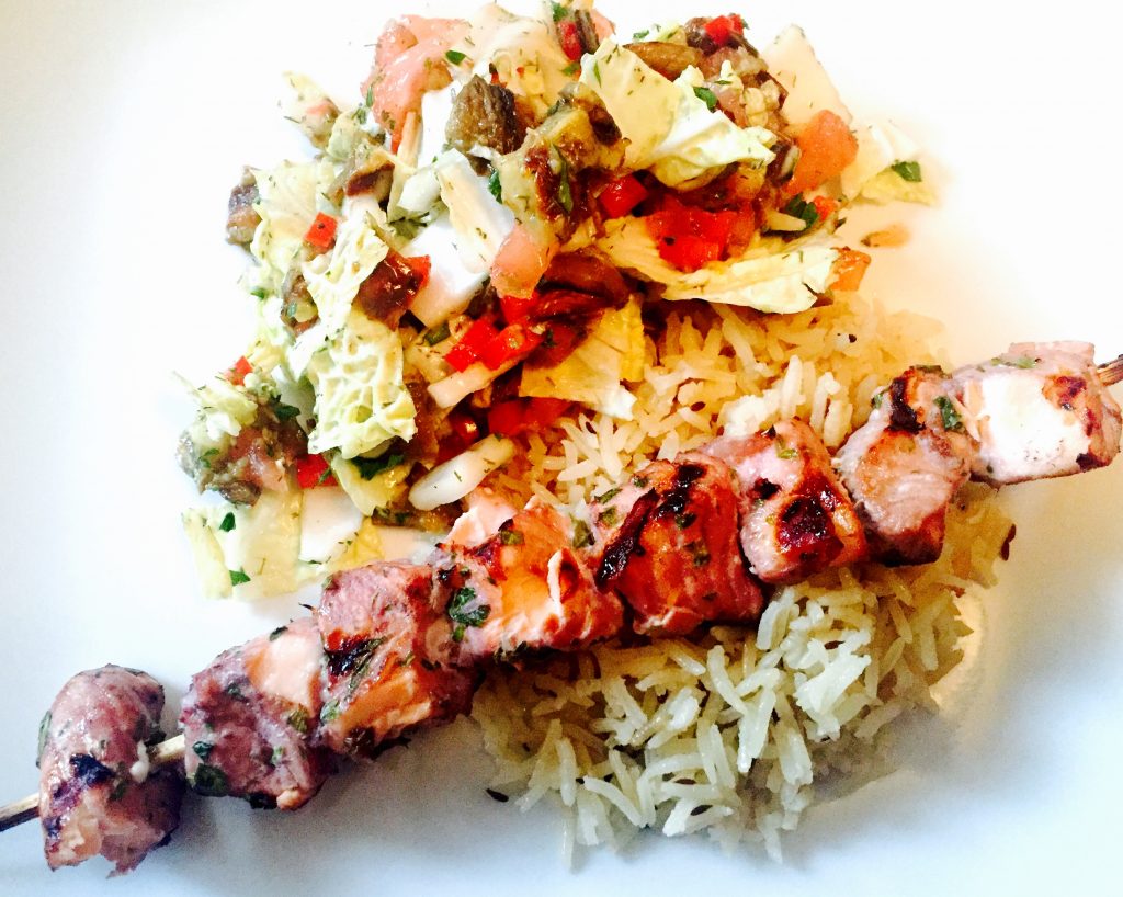 Turkmen salmon shashlik on rice with roasted eggplant salad