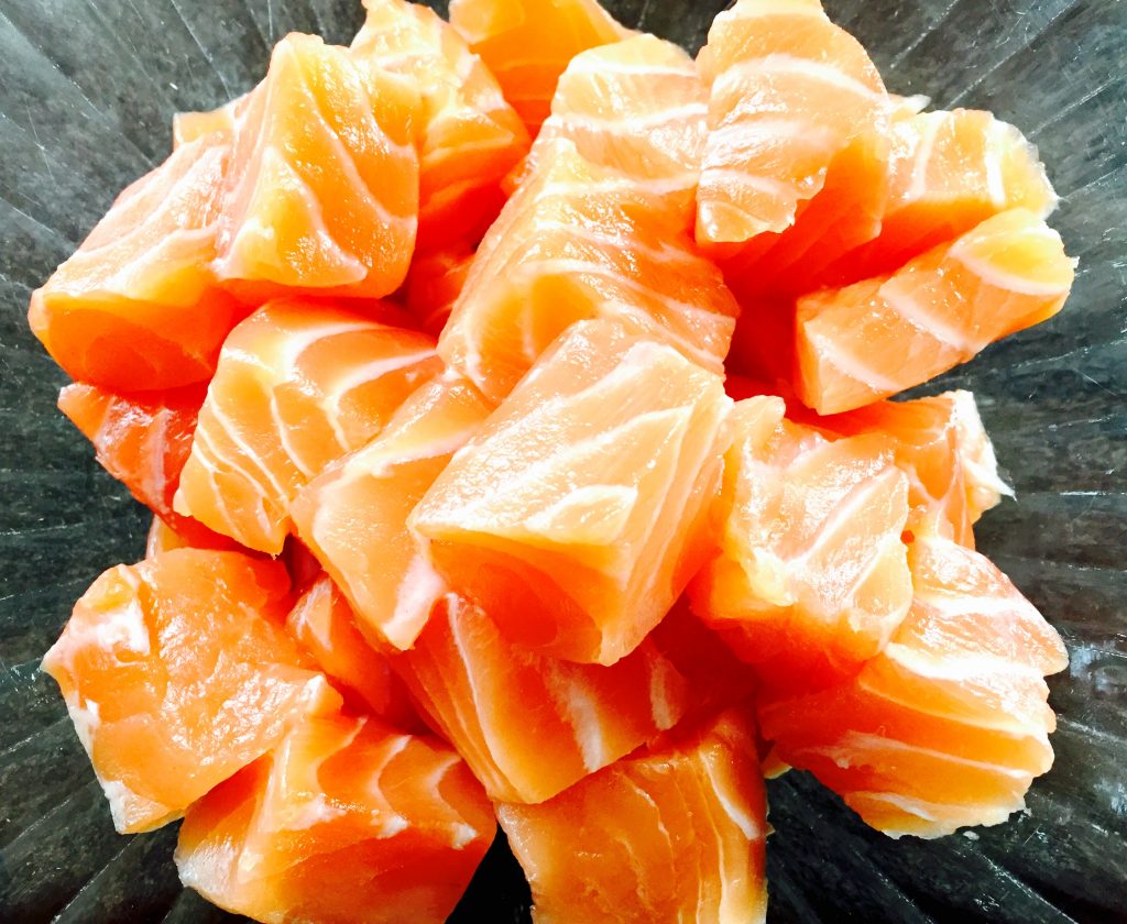Fresh cubes of salmon ready to be marinated Turkmen style