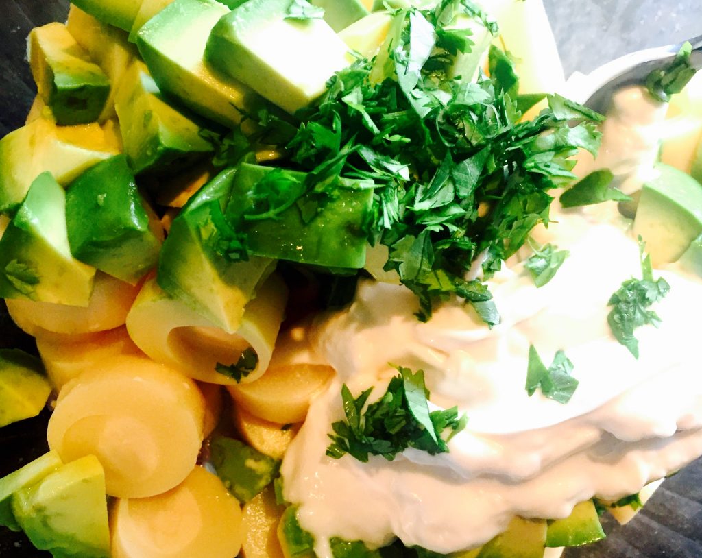 Delicately delightful hearts of palm with chunks of avocado, fresh cilantro, lime juice, minced red onion and a bit of soy & dairy free mayo