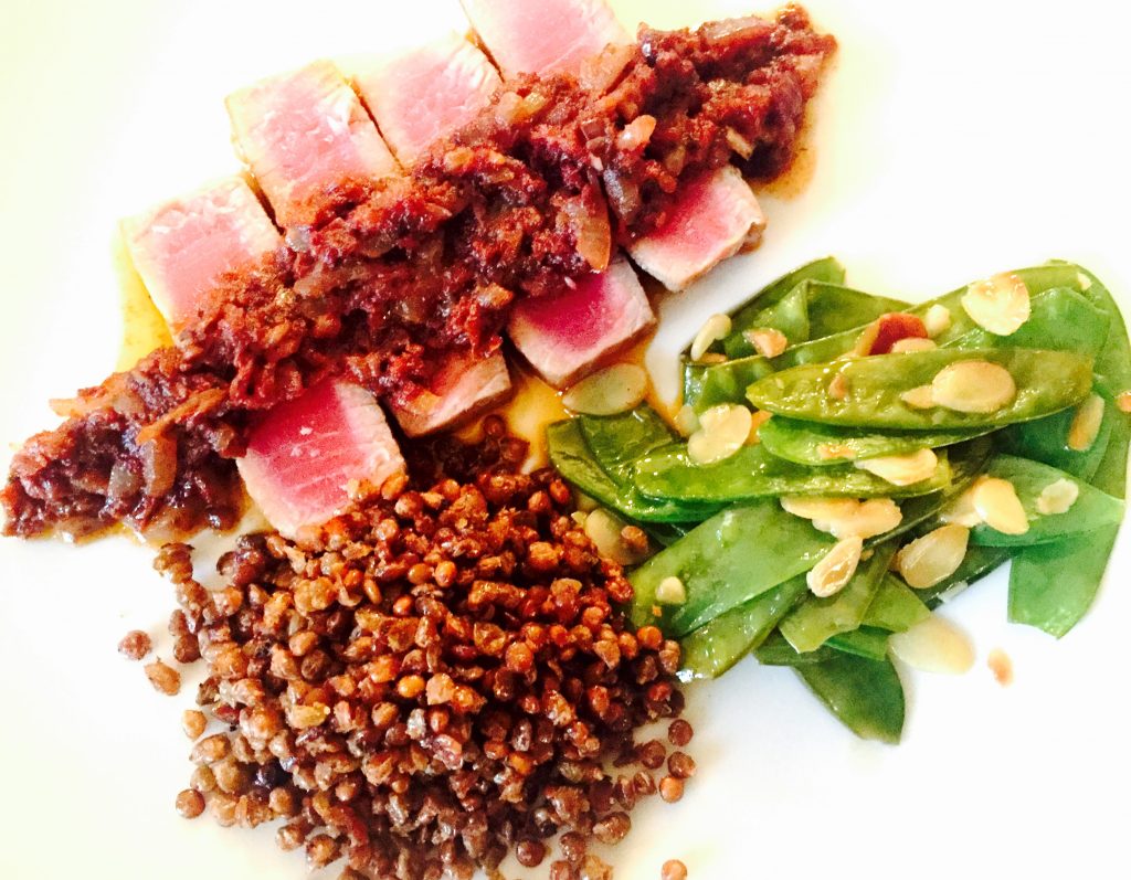 Seared tuna with a savoury sun-dried tomato sauce, some sliced almond snow peas and lovely roasted lentils