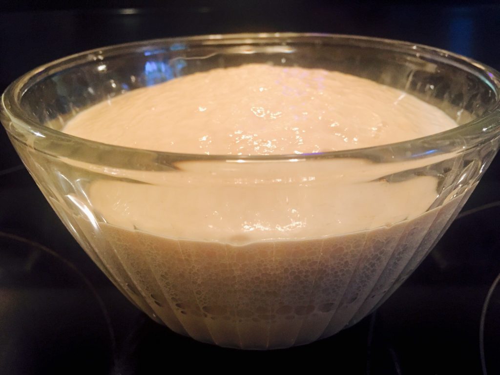 Proofing the yeast in warm water and a touch of sugar