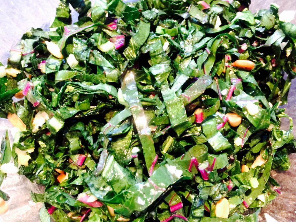 Kohlrabi leaf salad with a fresh garlic vinaigrette