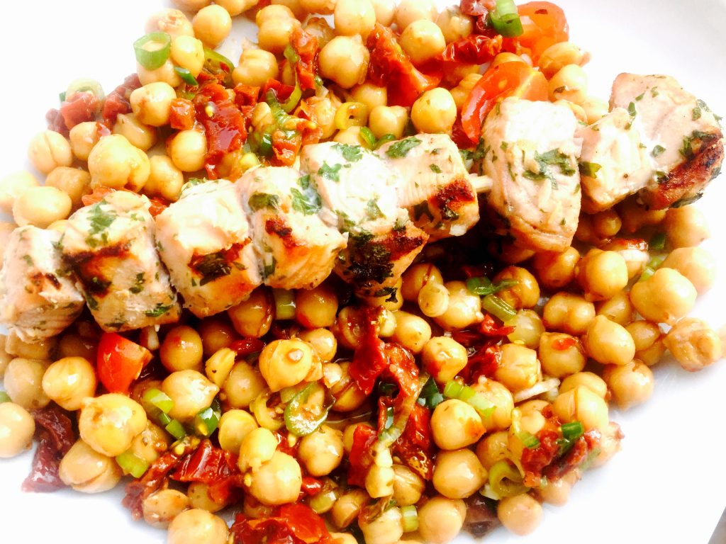 Turkmen salmon shashlik served on delicious chickpea salad