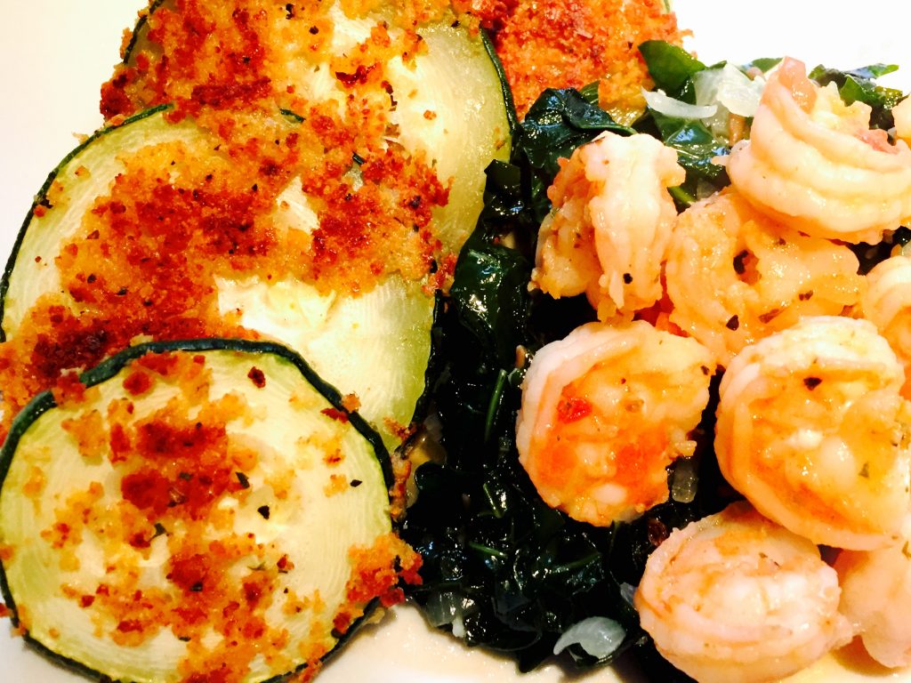 Breaded zucchini with sautéed shrimp and turnip greens