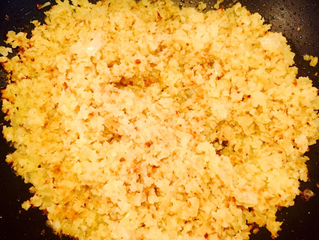 Deceivingly delicious cauliflower 'rice' with sautéed garlic & onions