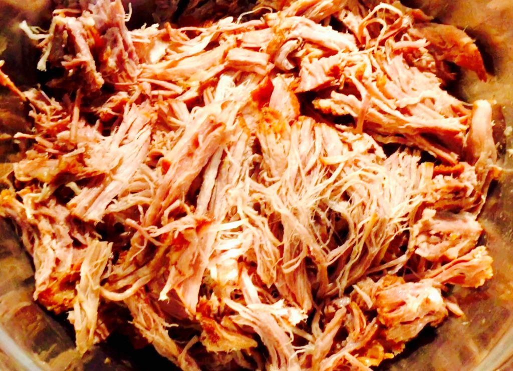 Succulent slow-roasted pulled pork ready to receive some delicious home made BBQ sauce