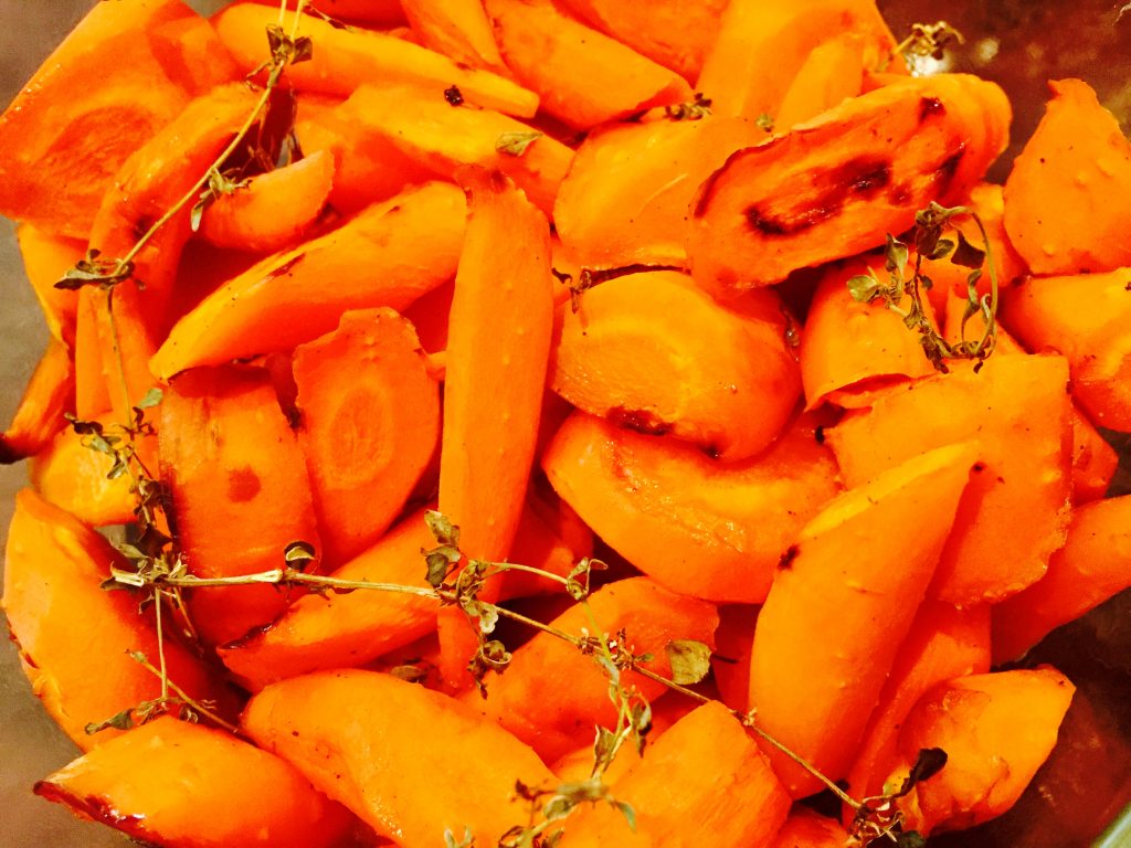 These roasted maple-glazed carrots with fresh thyme are such a delicious Canadian addition to any Thanksgiving menu