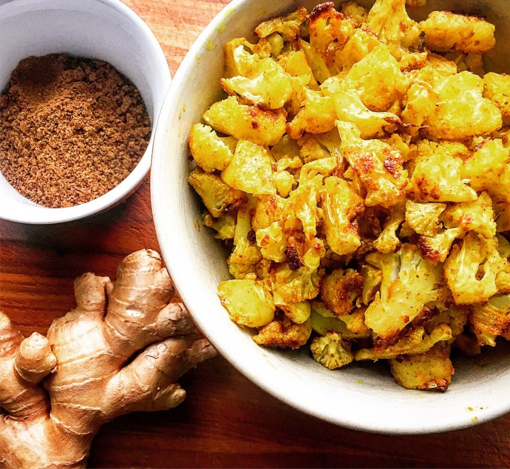 Roasted curried cauliflower florets ready to be included with other deliciously savoury ingredients