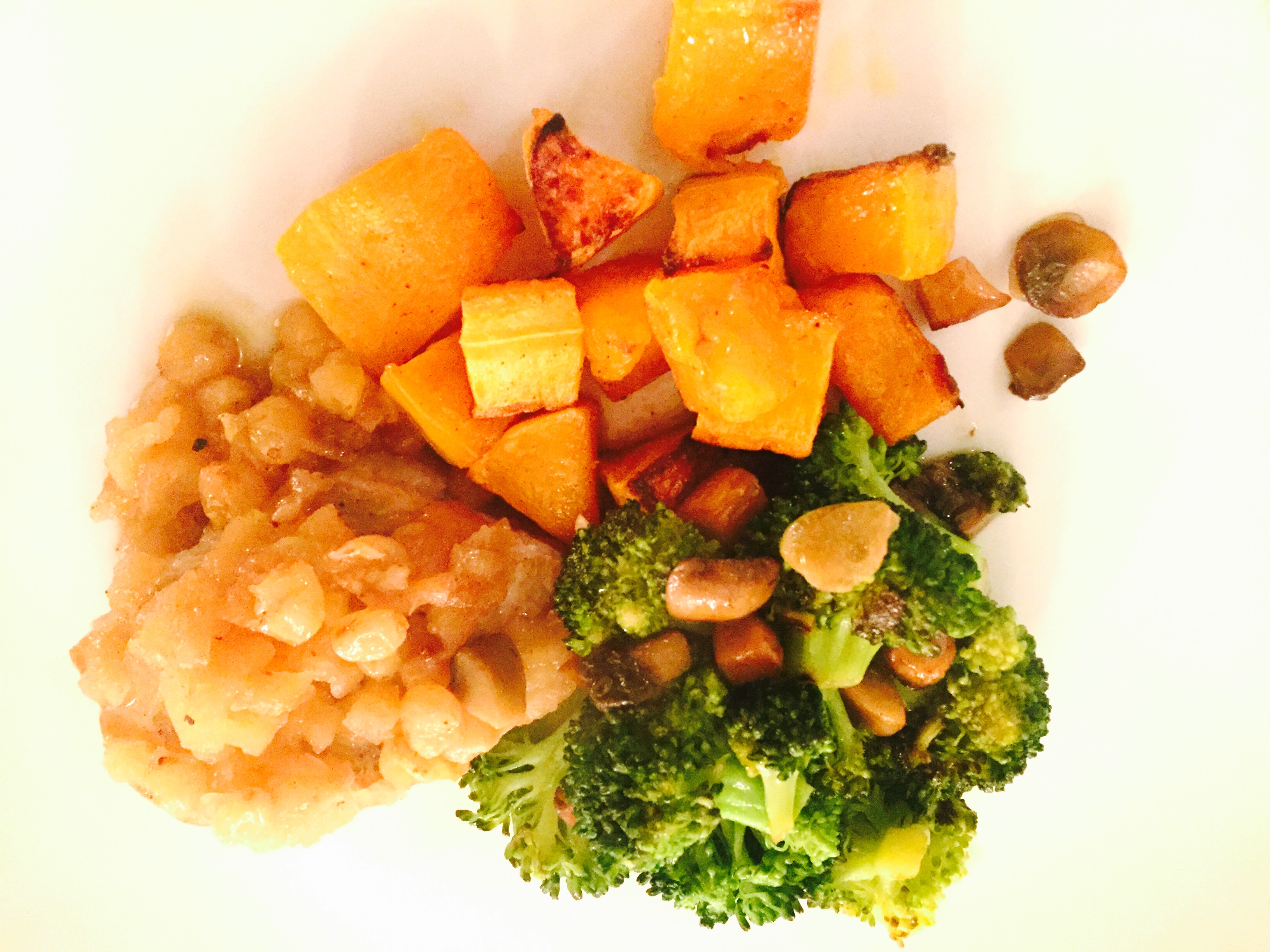 Organic pork chops in apple & raisin sauce with roasted butternut squash and sautéed broccoli & mushrooms