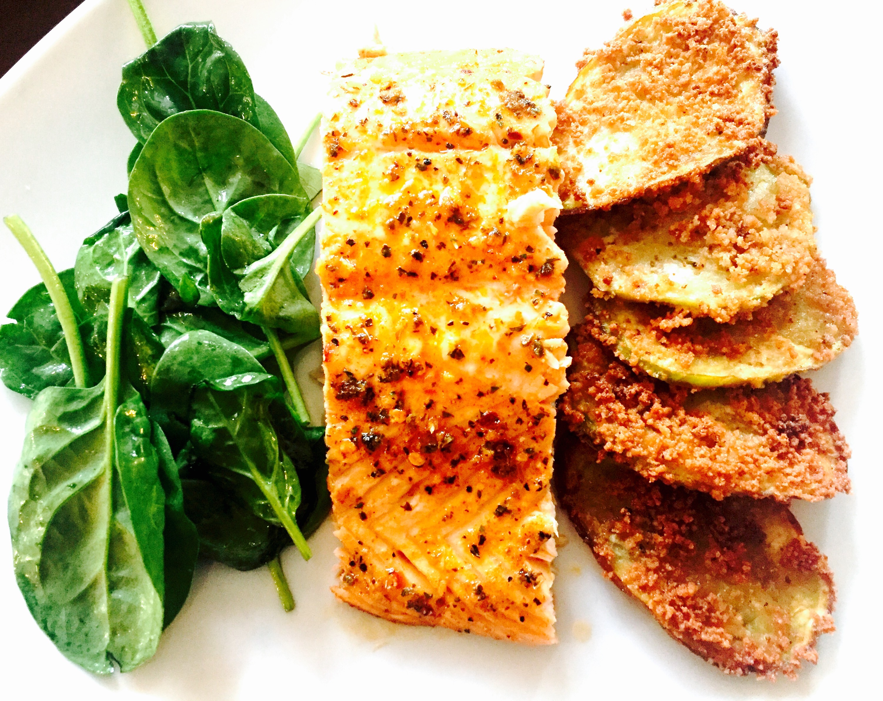 Baked salmon with breaded eggplant and spinach salad