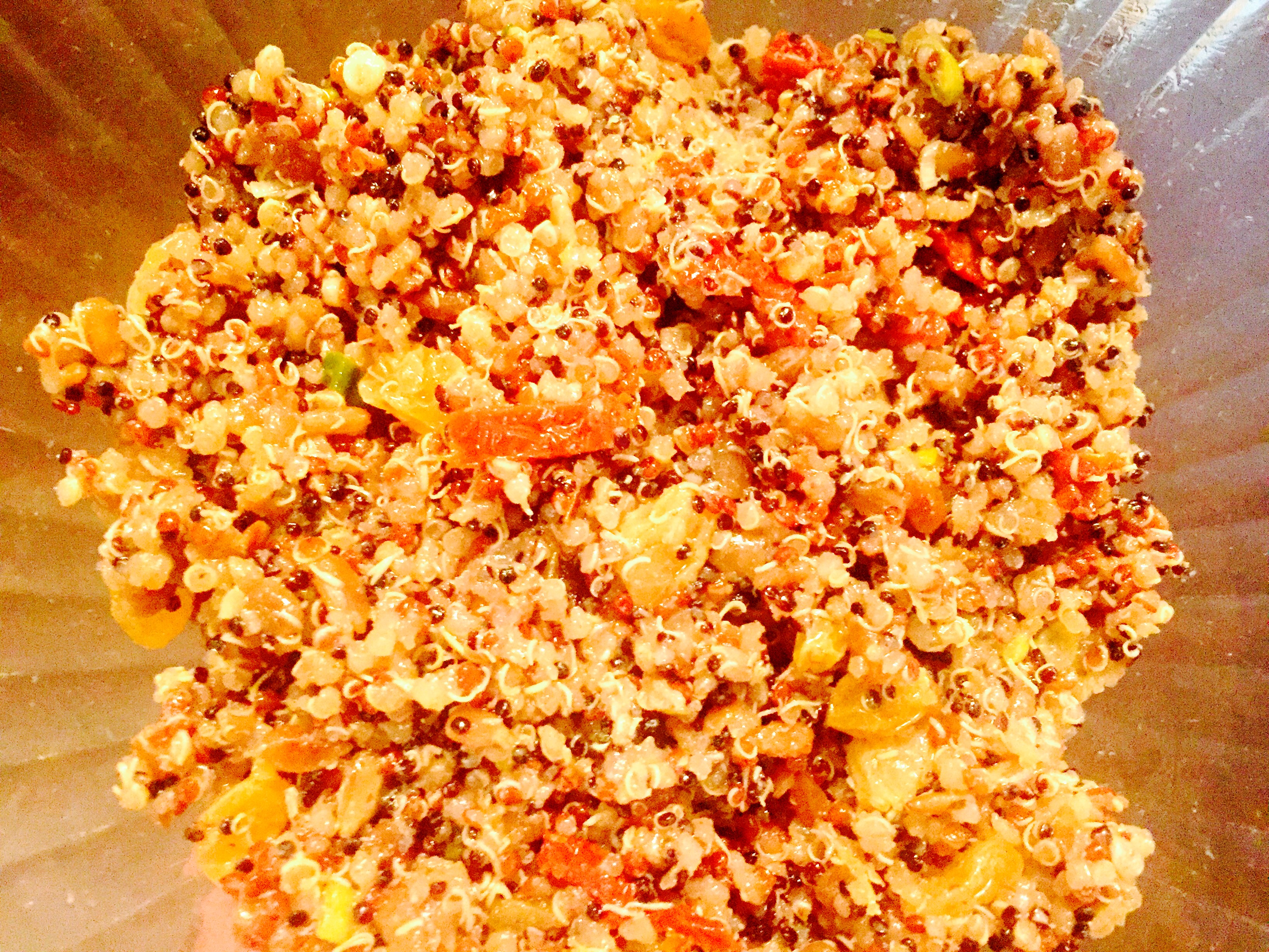Completely addictive quinoa salad with sun derived tomatoes, golden raisins and toasted sunflower seeds