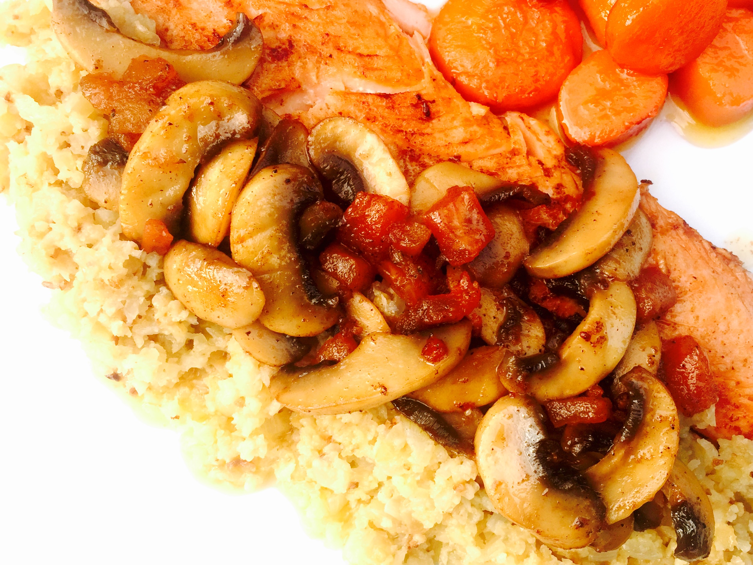 Delicious pan fried trout smothered in mushrooms and onions with maple-glazed carrots and cauliflower rice!
