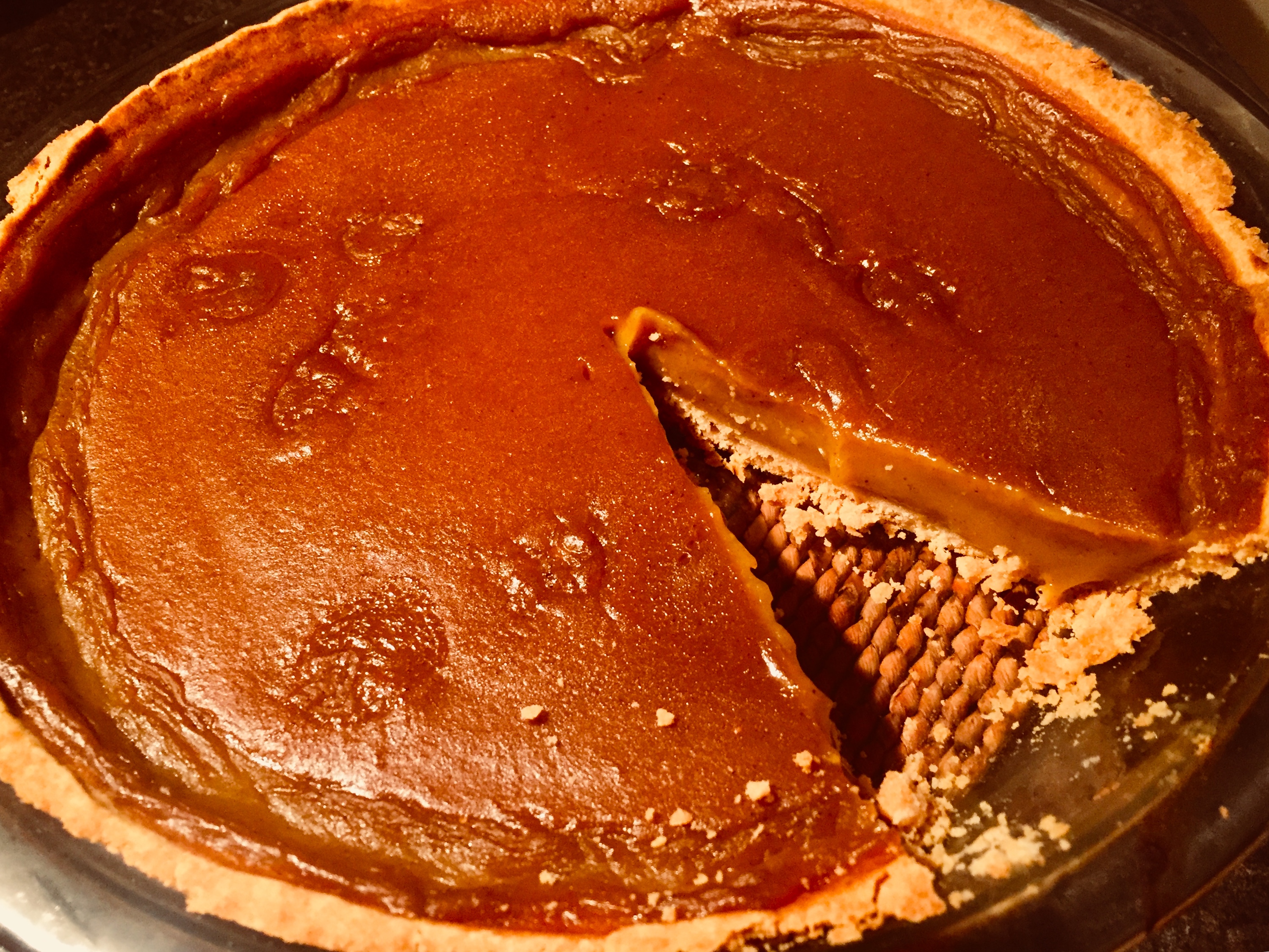Delicious homemade pumpkin pie made from scratch with roasted pumpkin and a delicious gluten free pie shell
