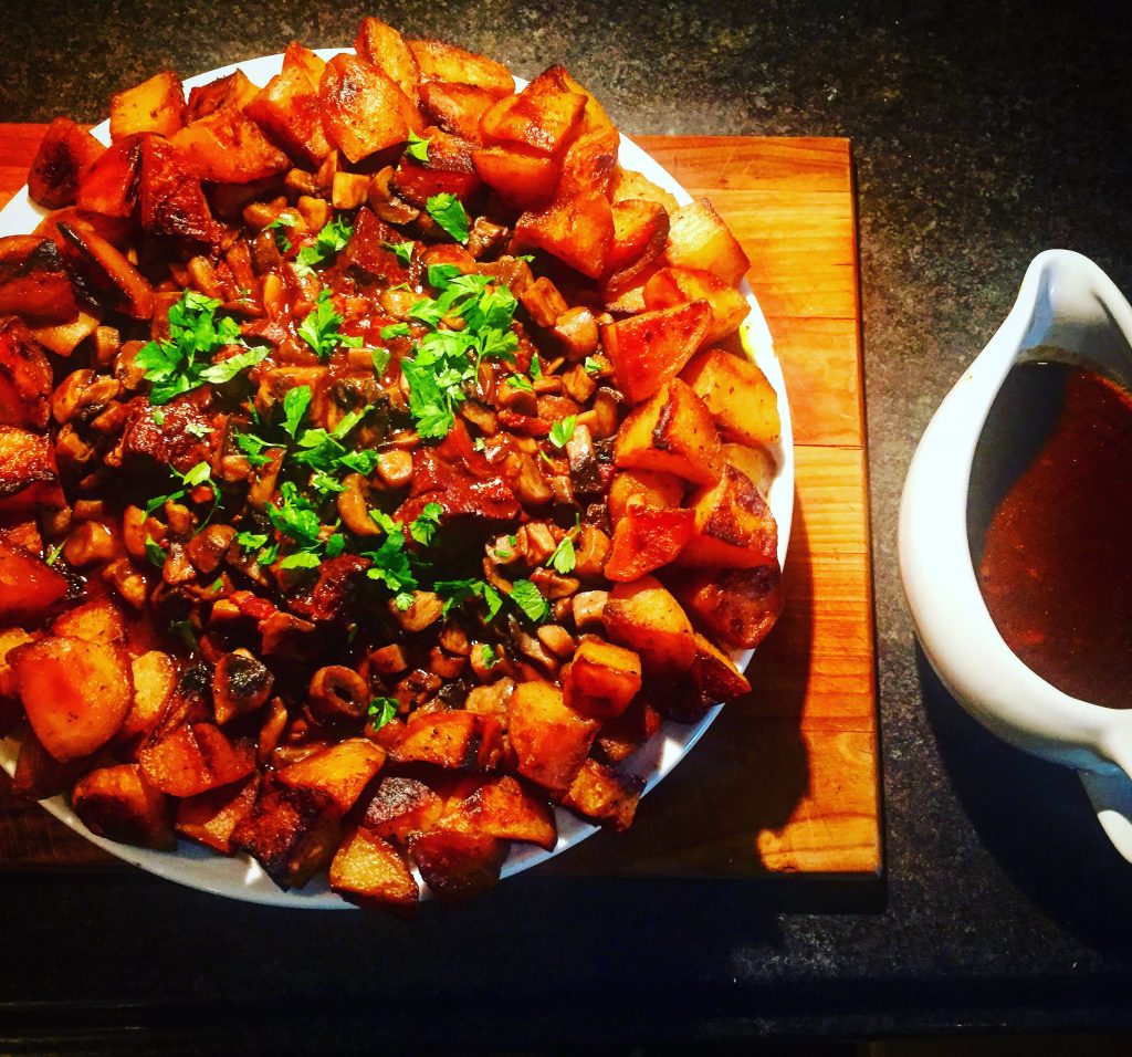 Luxurious beef bourguignon with sauteed mushrooms and roasted potatoes, prepared entirely on the stovetop